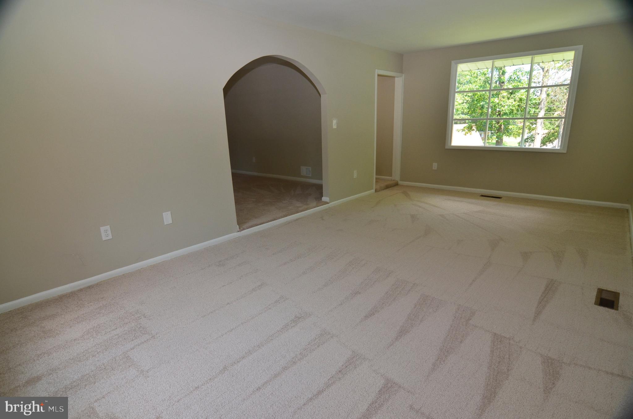 8604 Contee Road Laurel, MD 20708 - Photo 9 of 56 an empty room with windows