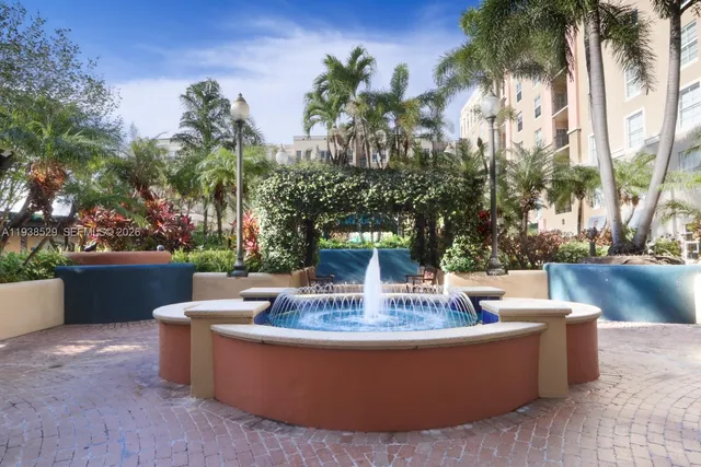 a view of swimming pool with outdoor seating