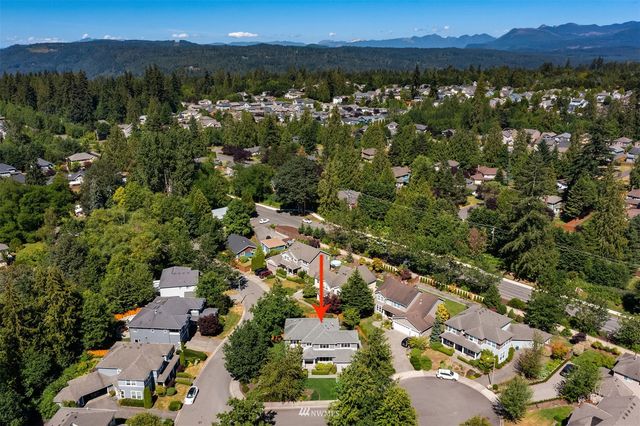 an aerial view of residential building and green space