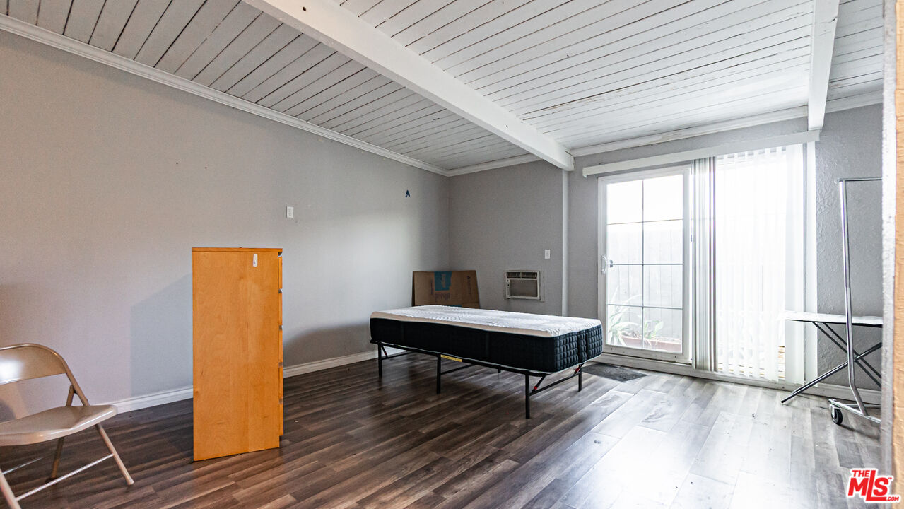 892 Vassar Street Pomona, CA 91767 - Photo 12 of 28 a living room with furniture a table and large window