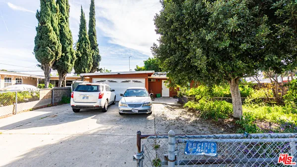 a white house with a outdoor space
