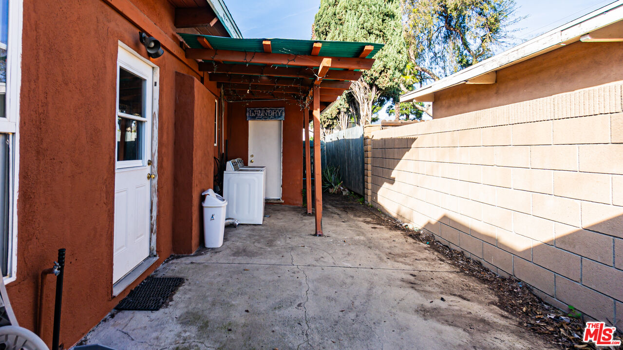 892 Vassar Street Pomona, CA 91767 - Photo 21 of 28 a view of a porch with a bench