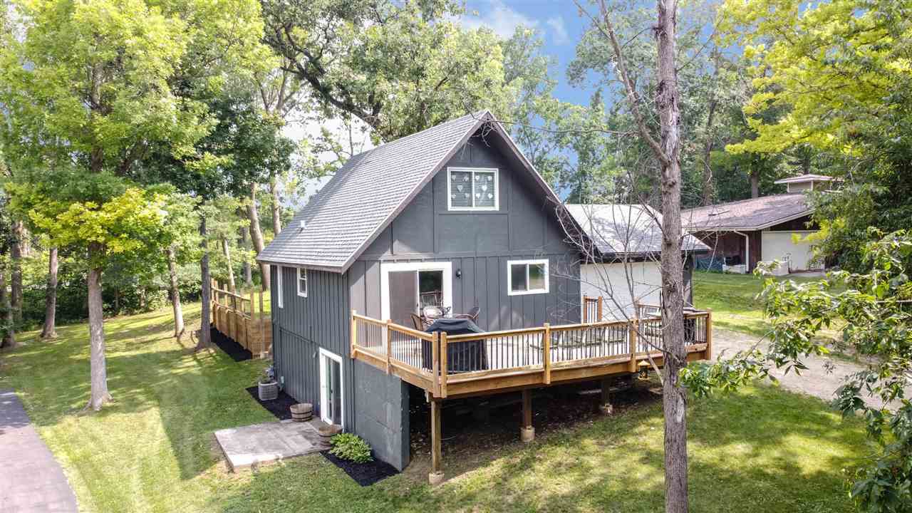 1088 Winborne Road Lake Summerset, IL 61019 - Photo 1 of 22 a aerial view of a house with a yard from a balcony
