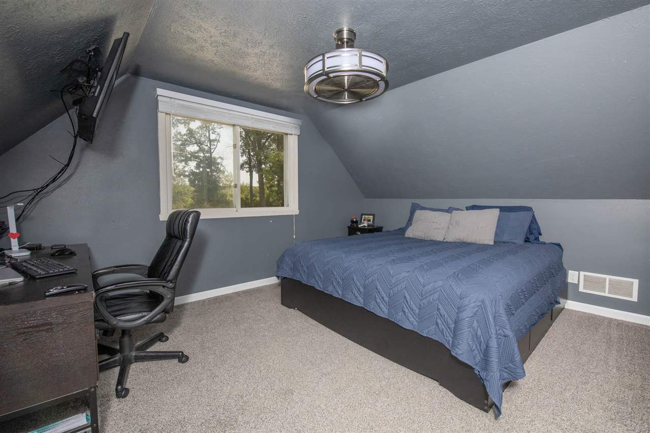 1088 Winborne Road Lake Summerset, IL 61019 - Photo 12 of 22 a bedroom with a bed and a window