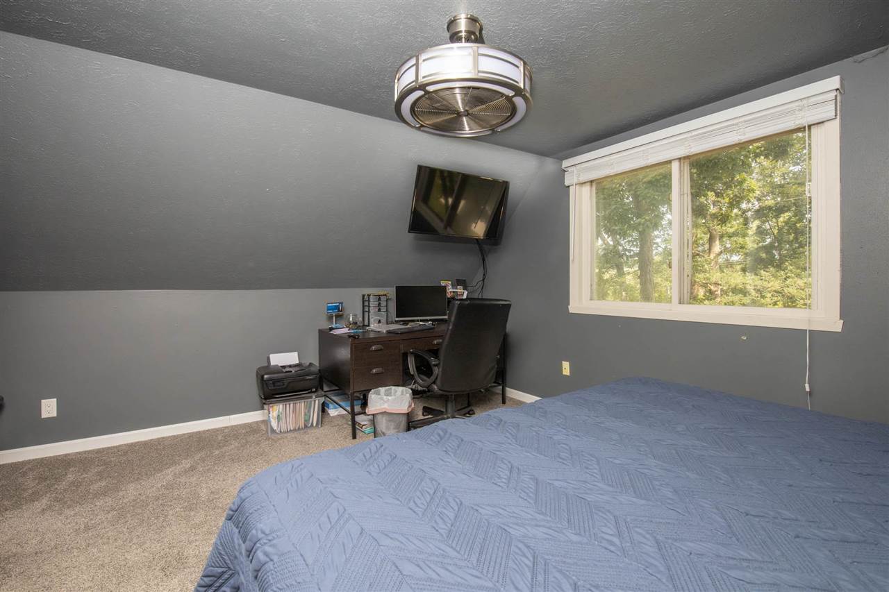 1088 Winborne Road Lake Summerset, IL 61019 - Photo 13 of 22 a bedroom with a bed and a window