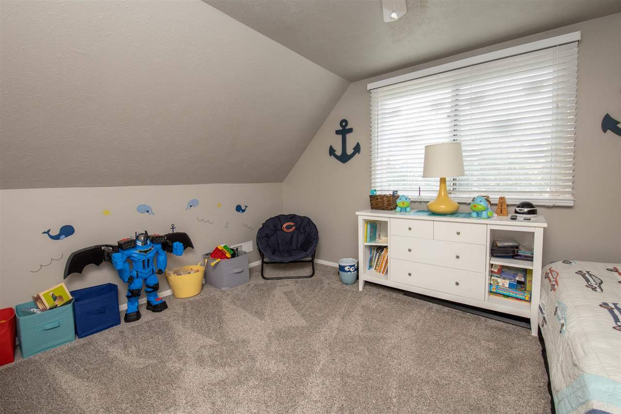 1088 Winborne Road Lake Summerset, IL 61019 - Photo 14 of 22 a view of a bedroom with baby toys