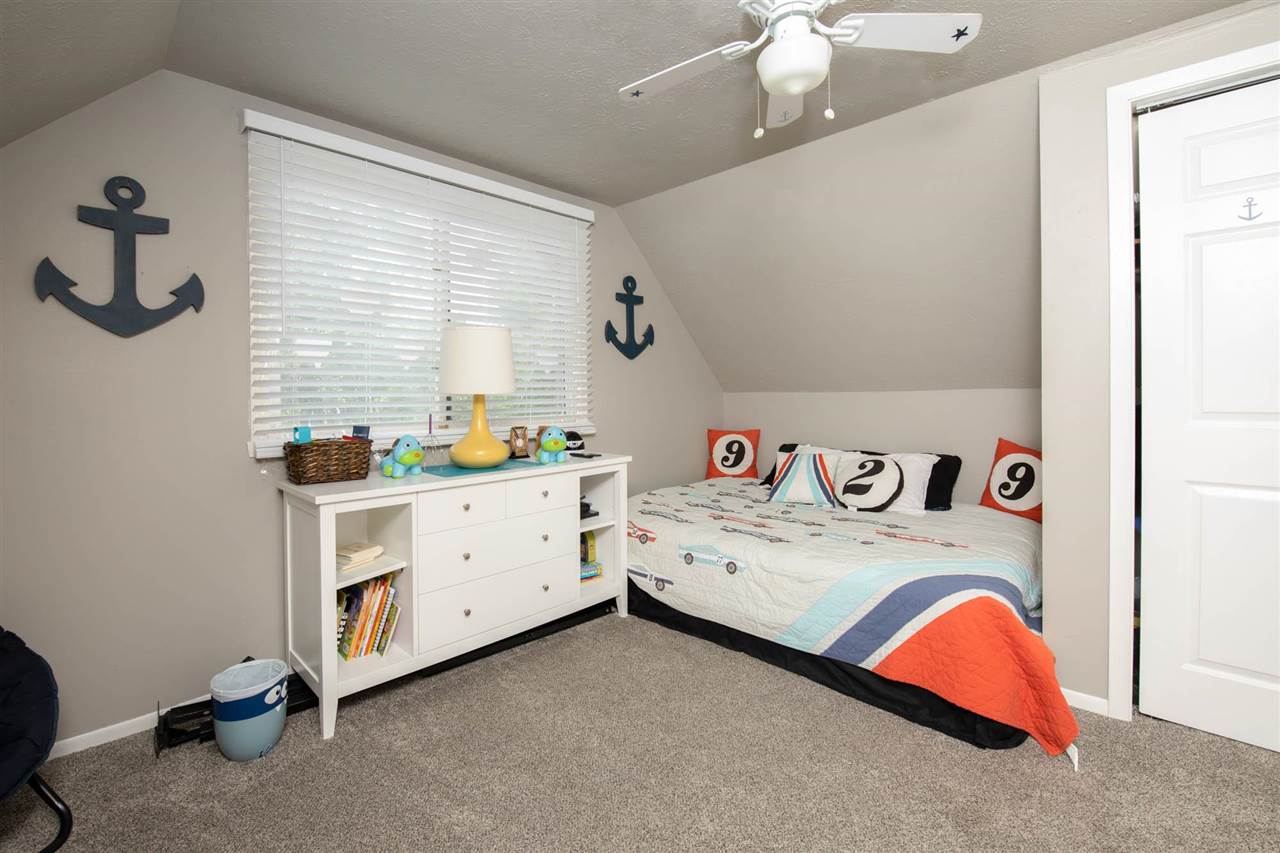 1088 Winborne Road Lake Summerset, IL 61019 - Photo 15 of 22 a bedroom with a bed and a dresser