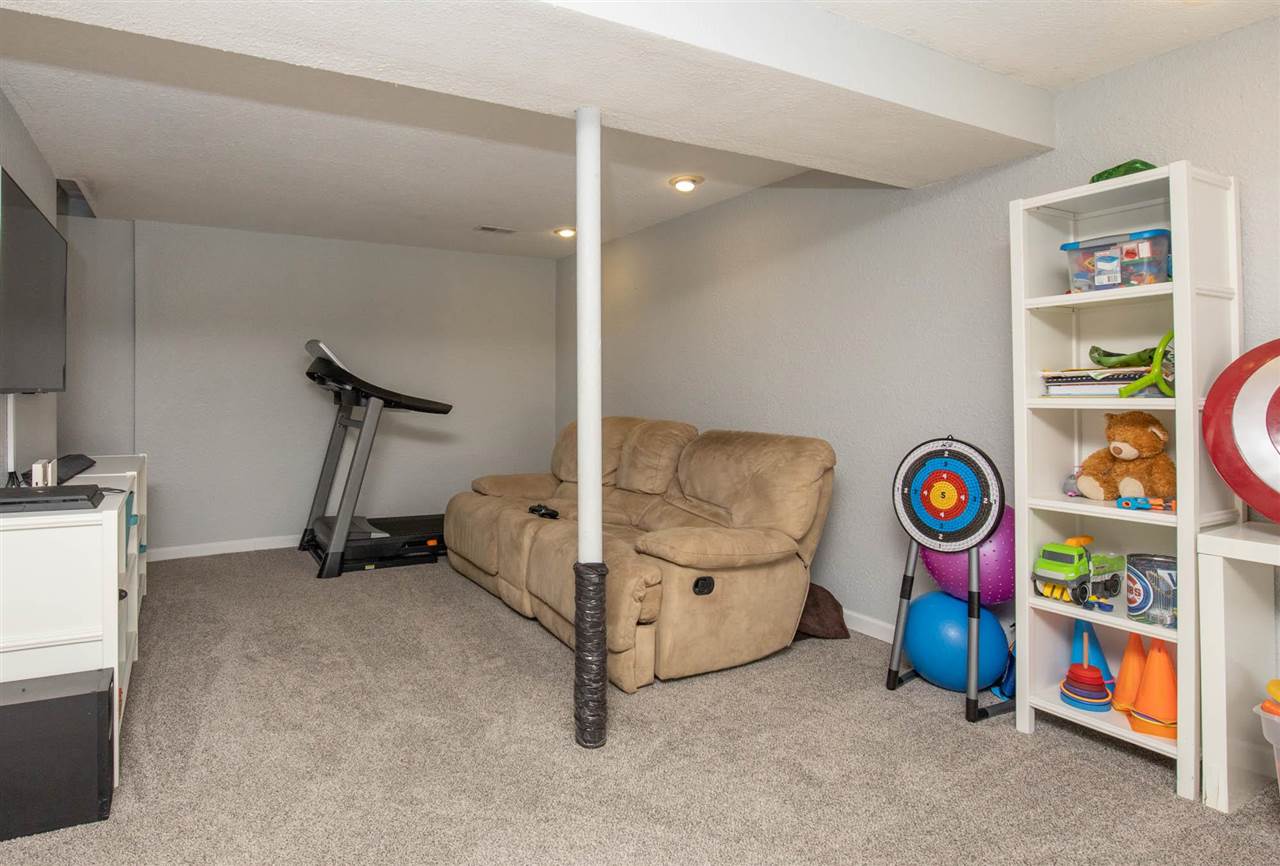 1088 Winborne Road Lake Summerset, IL 61019 - Photo 18 of 22 a view of an empty room with window and air hockey table