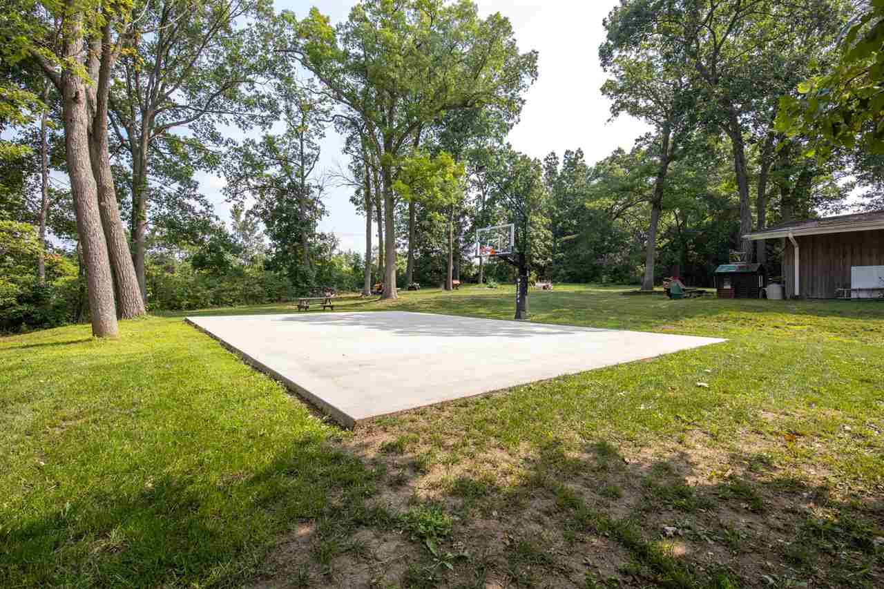 1088 Winborne Road Lake Summerset, IL 61019 - Photo 20 of 22 a view of a park with trees in the background
