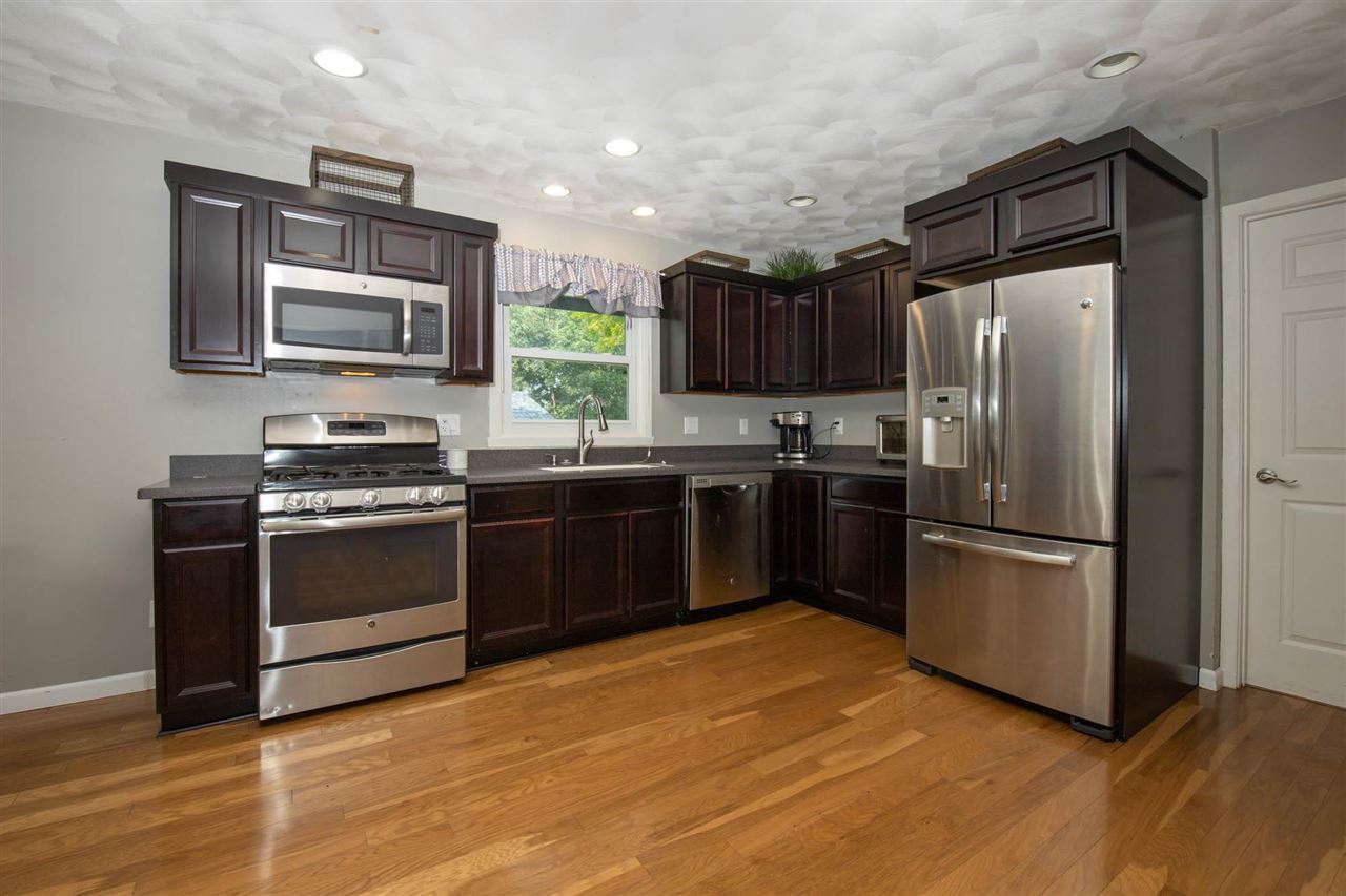 1088 Winborne Road Lake Summerset, IL 61019 - Photo 6 of 22 a kitchen with a sink stainless steel appliances and cabinets
