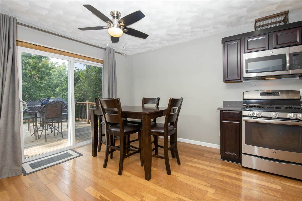 1088 Winborne Road Lake Summerset, IL 61019 - Photo 7 of 22 a view of a dining room with furniture window and wooden floor