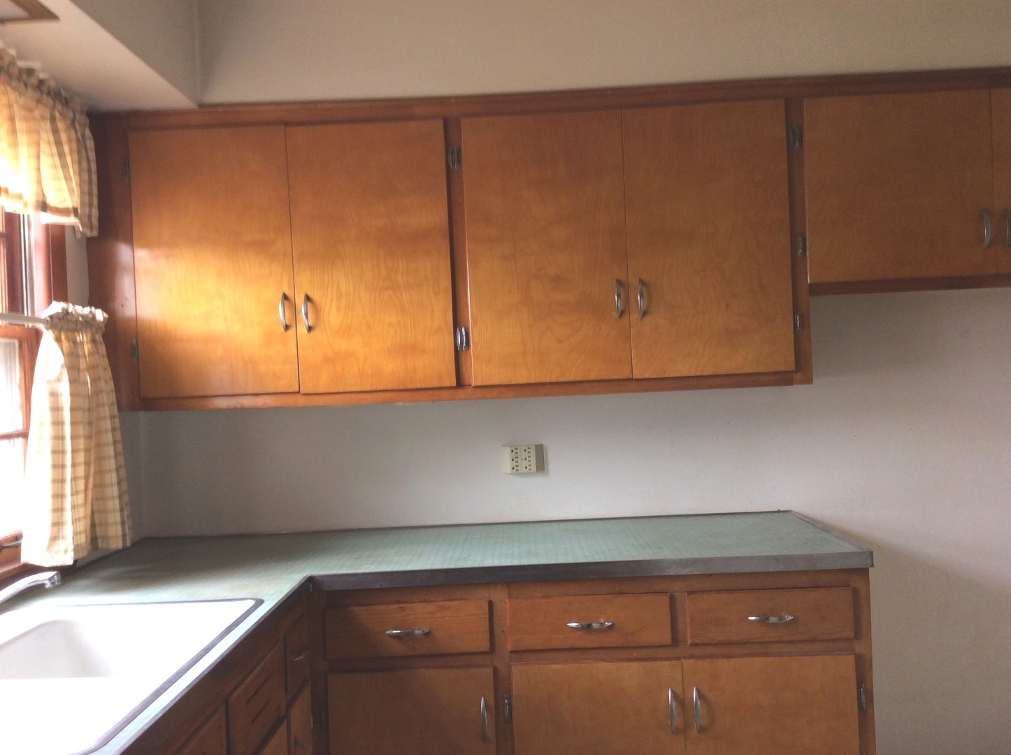 1436 Evergreen Road Homewood, IL 60430 - Photo 12 of 32 a kitchen with a sink and cabinets