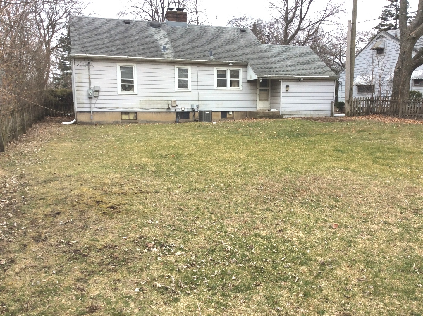 1436 Evergreen Road Homewood, IL 60430 - Photo 32 of 32 a front view of a house with a yard
