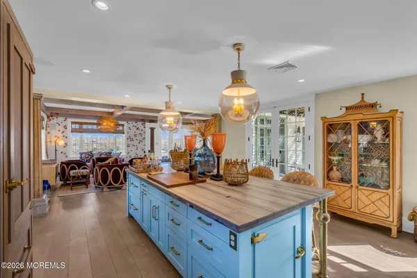 a kitchen with stainless steel appliances granite countertop a stove and a sink