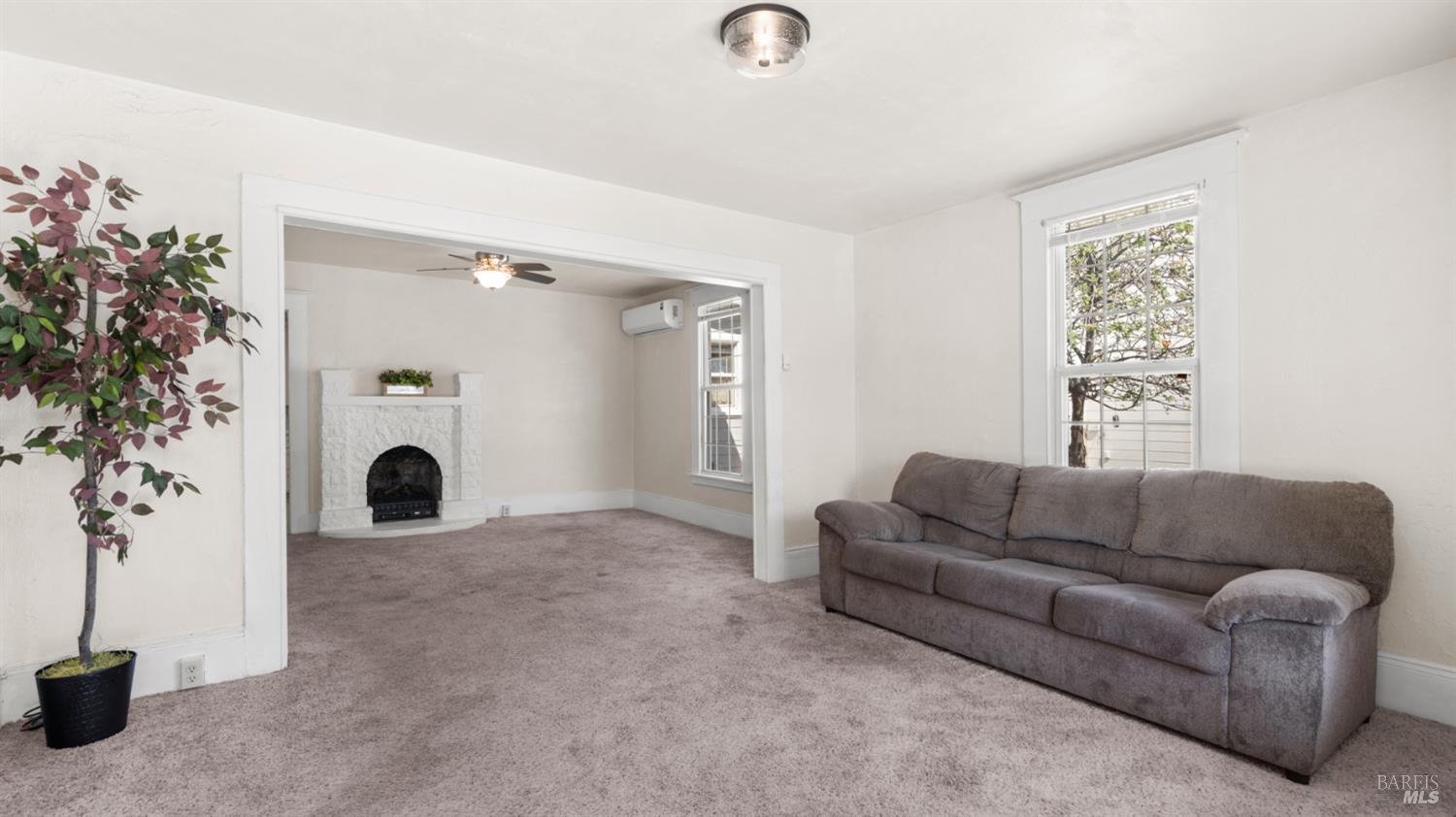 125 Kendal Street Vacaville, CA 95688 - Photo 10 of 45 a living room with furniture and a potted plant