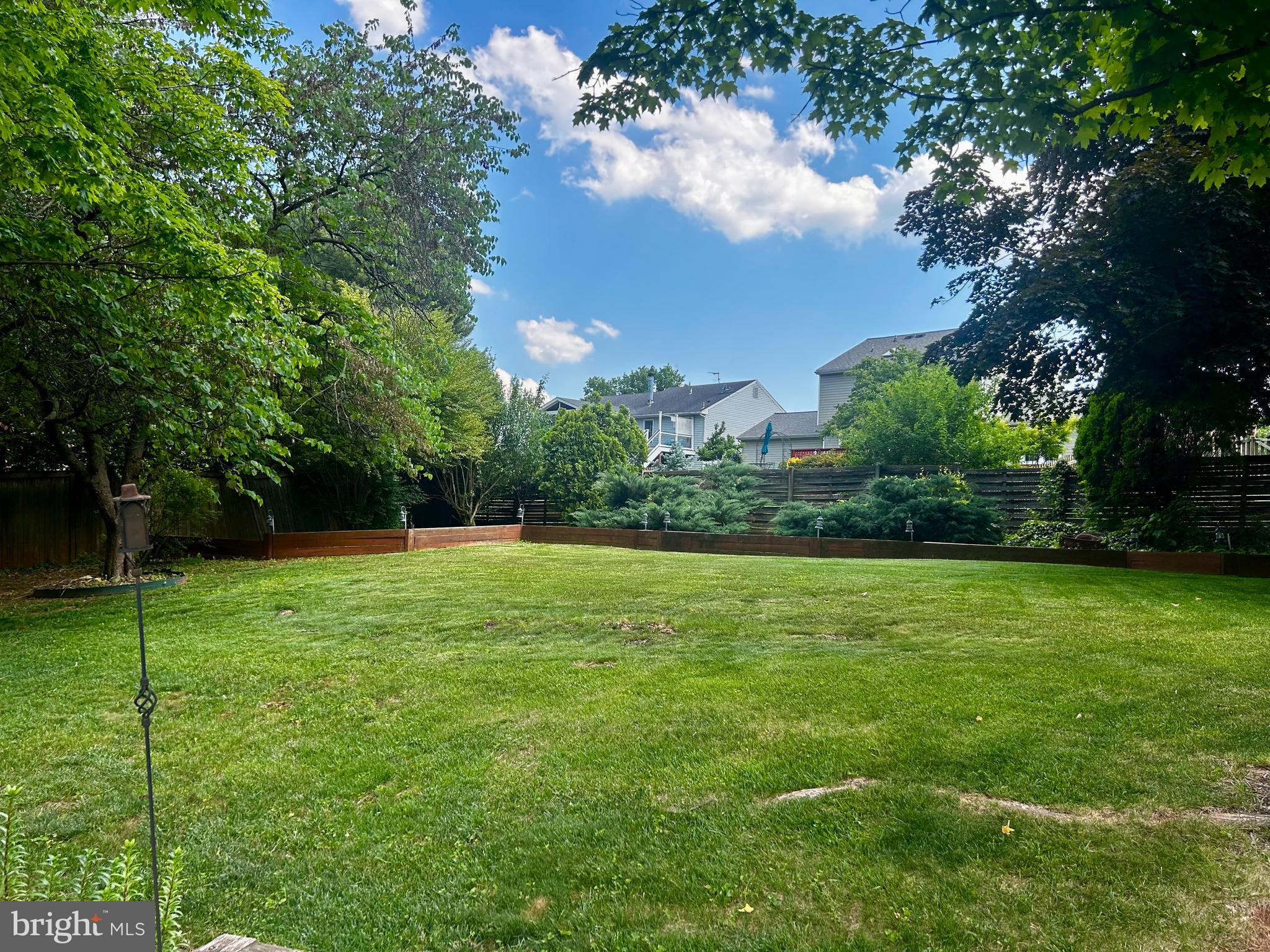 111 Environs Road Sterling, VA 20165 - Photo 3 of 50 a view of a grassy field