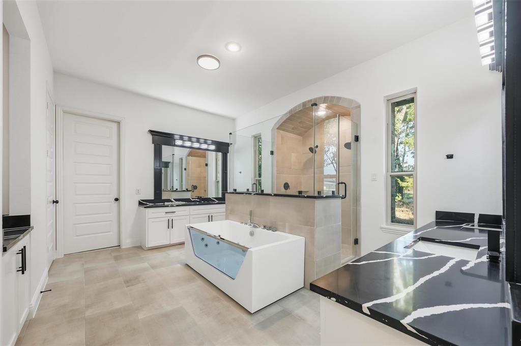 300 Seacross Court Combine, TX 75159 - Photo 26 of 39 a large white kitchen with a large window