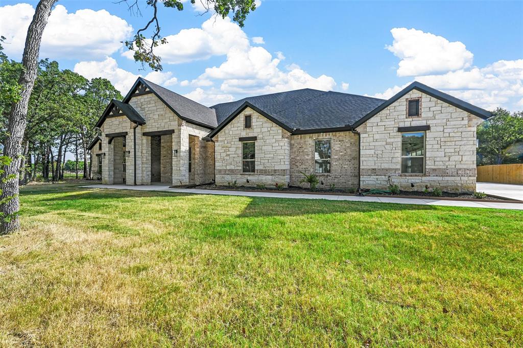 300 Seacross Court Combine, TX 75159 - Photo 9 of 39 a front view of house with yard and green space