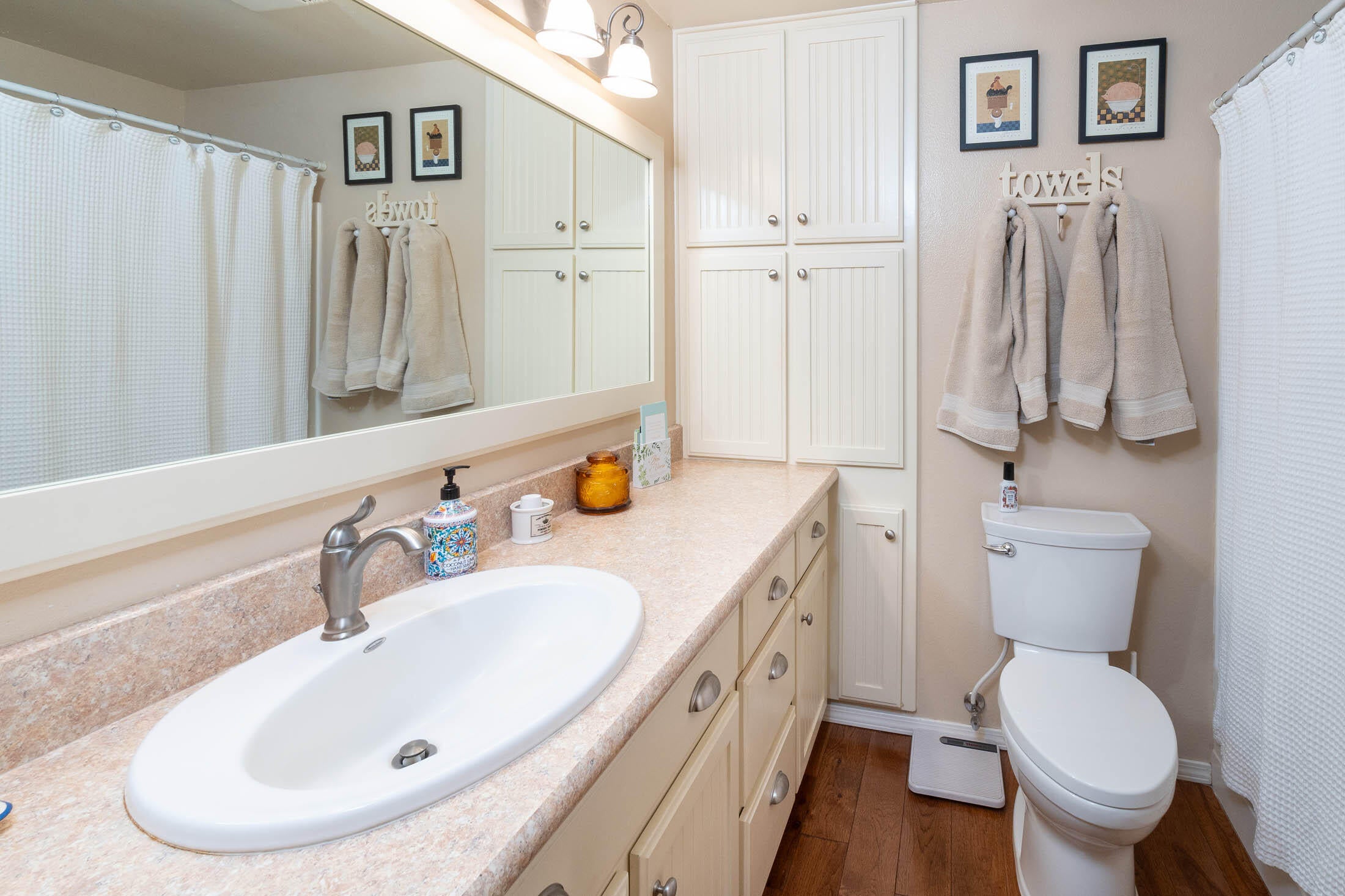 21665 Old Red Road Bend, OR 97702 - Photo 16 of 34 Guest bath with built-in linen closet and nice storage.