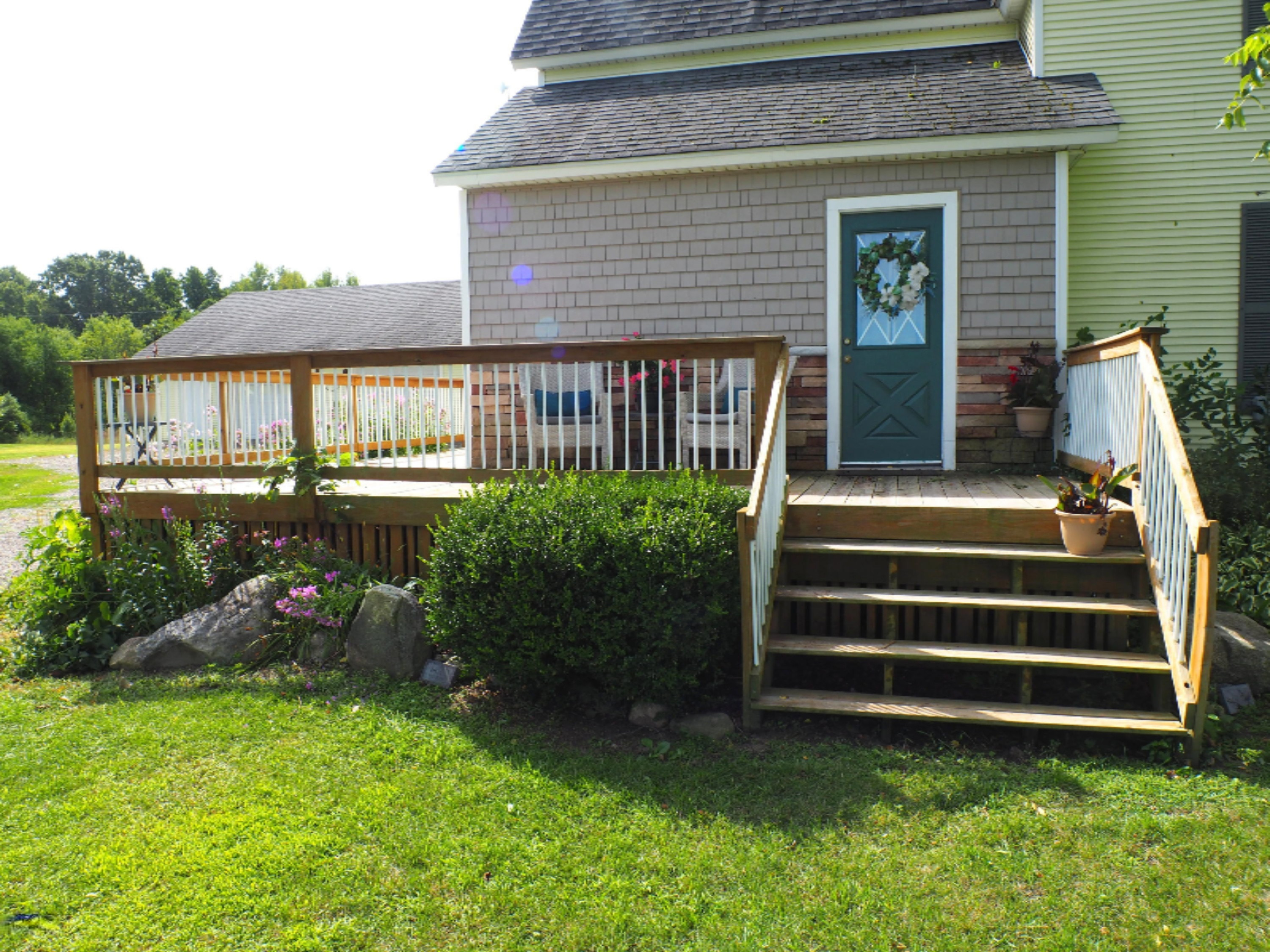 13846 Heffron Road Northeast Belding, MI 48809 - Photo 24 of 36 front entrance deck