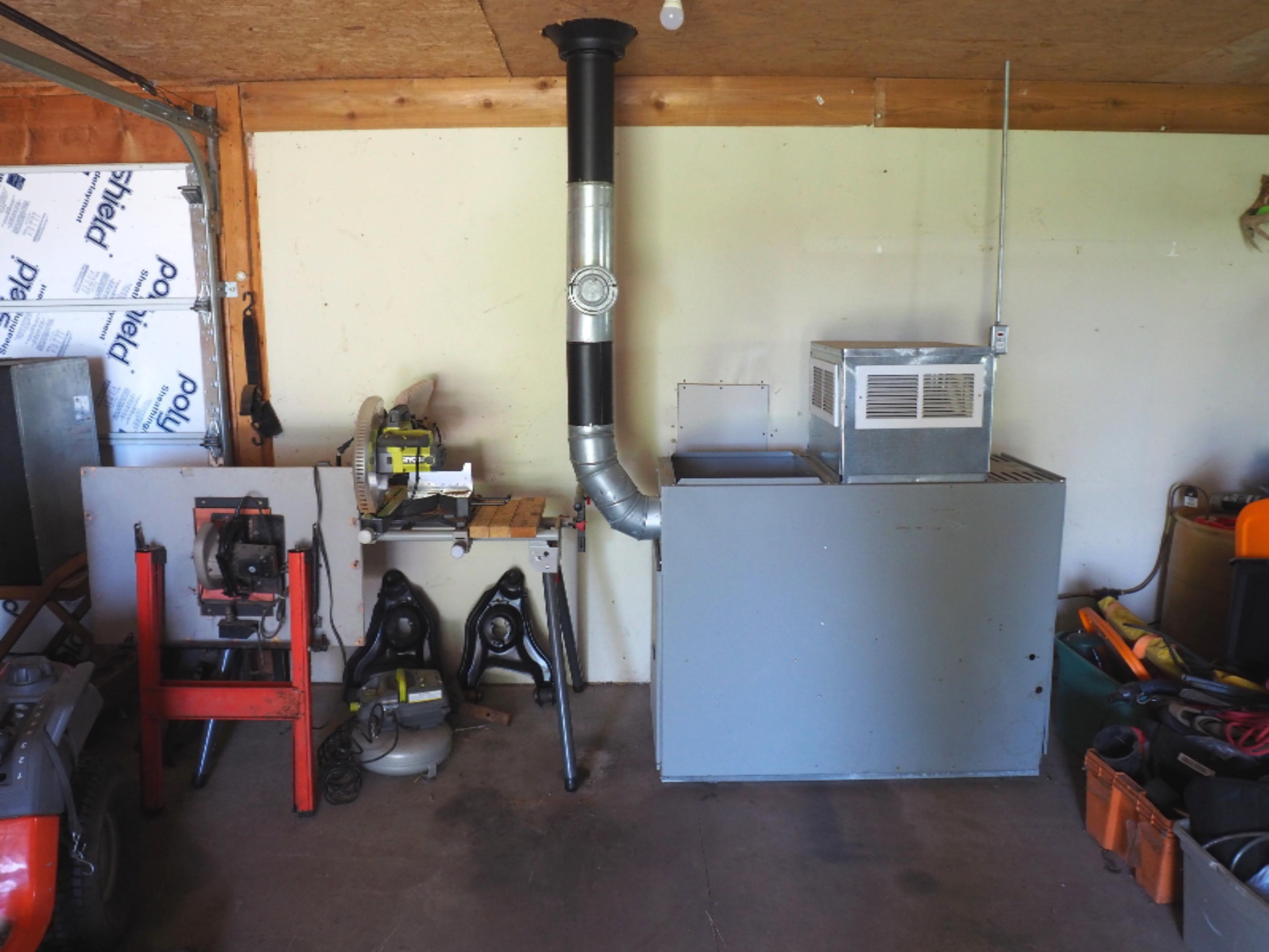 13846 Heffron Road Northeast Belding, MI 48809 - Photo 28 of 36 fuel oil furnace in garage