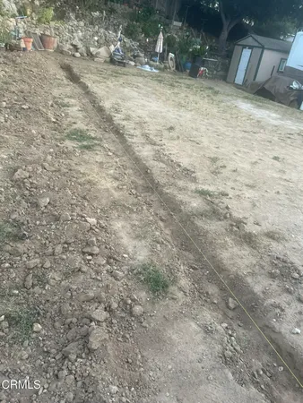 a view of outdoor space and yard