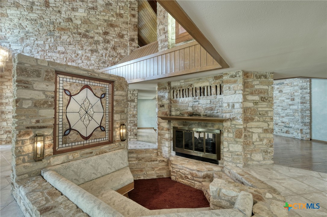 700 Breakaway Road Cedar Park, TX 78613 - Photo 4 of 38 Sunken fireplace sitting area