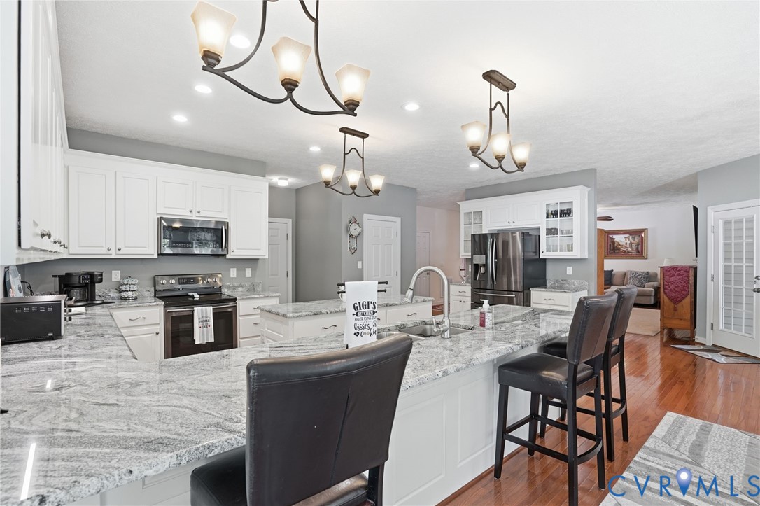 3600 Market Road Mechanicsville, VA 23111 - Photo 16 of 67 a large kitchen with a table and chairs
