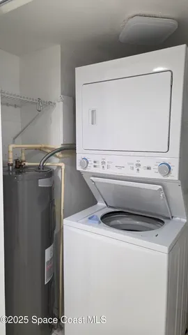 a room with balcony and furniture