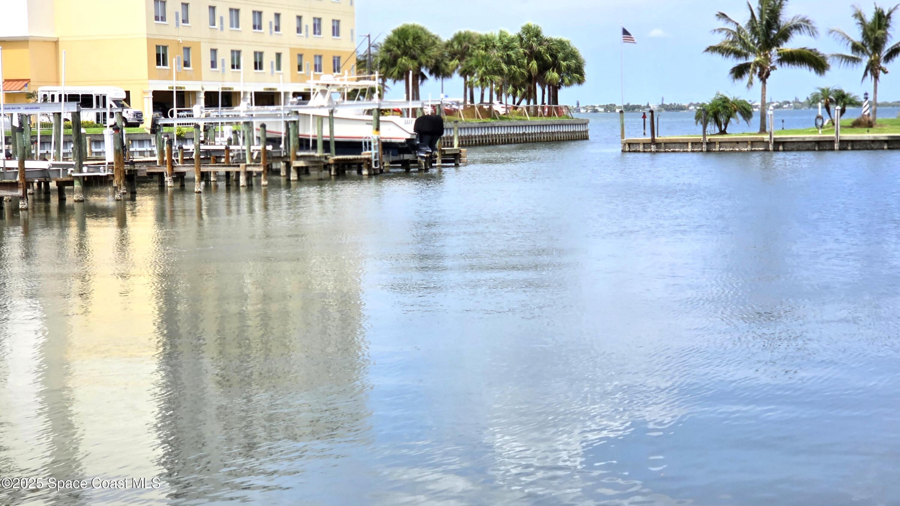 5055 Old Dixie Highway, Unit 403 Palm Bay, FL 32905 - Photo 29 of 32 a view of a lake with outdoor space