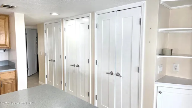 a view of a bathroom with a shower curtain