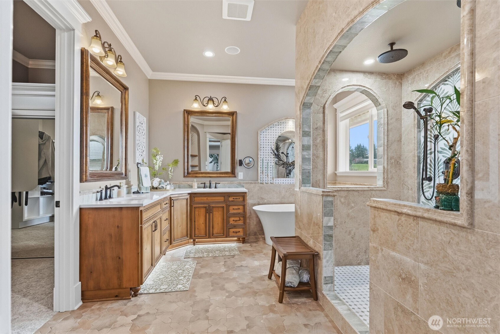 13232 84th Street Southeast Snohomish, WA 98290 - Photo 16 of 40 a large bathroom with mirror a sink a bathtub and next to a window