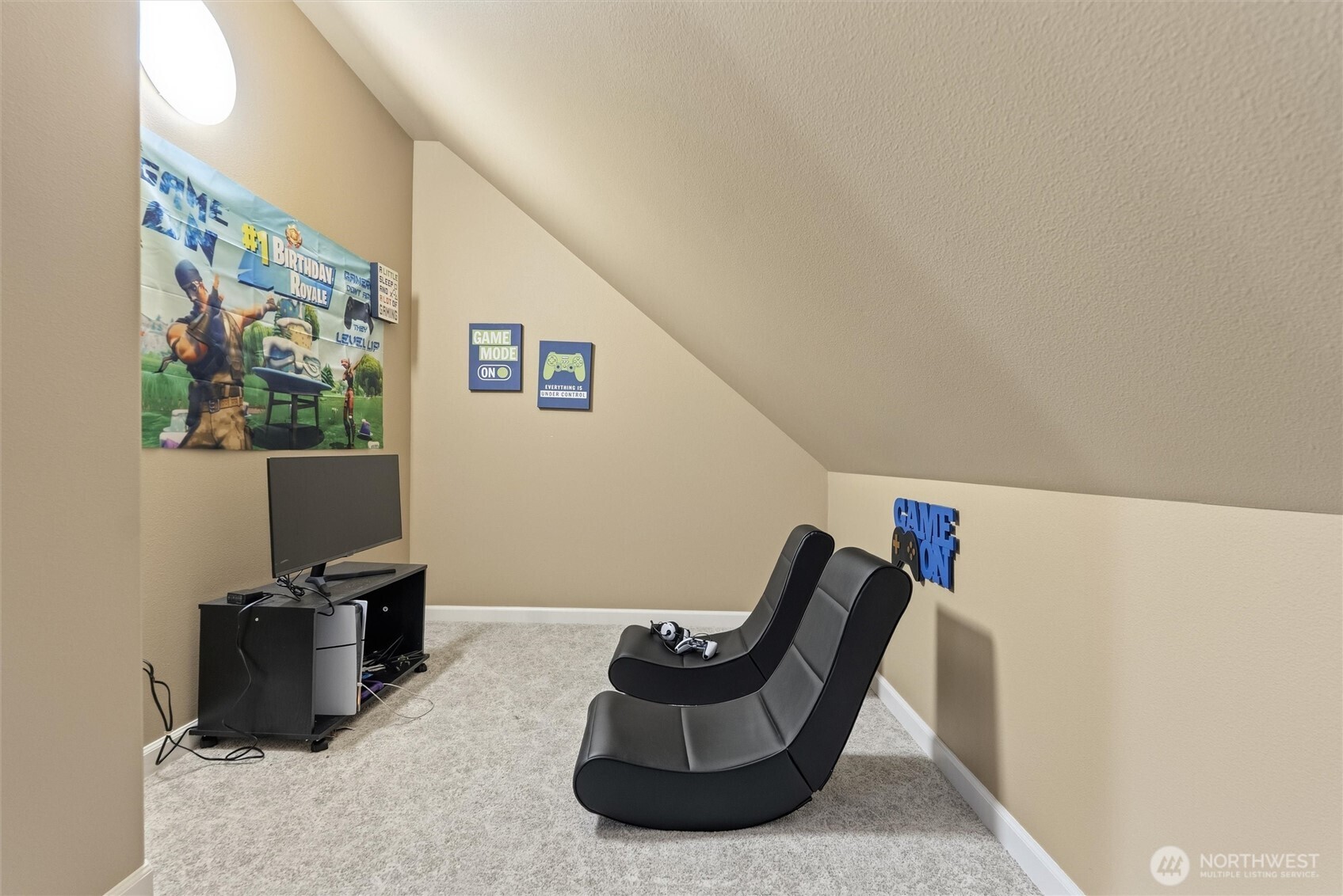 13232 84th Street Southeast Snohomish, WA 98290 - Photo 21 of 40 a living room with furniture and a flat screen tv