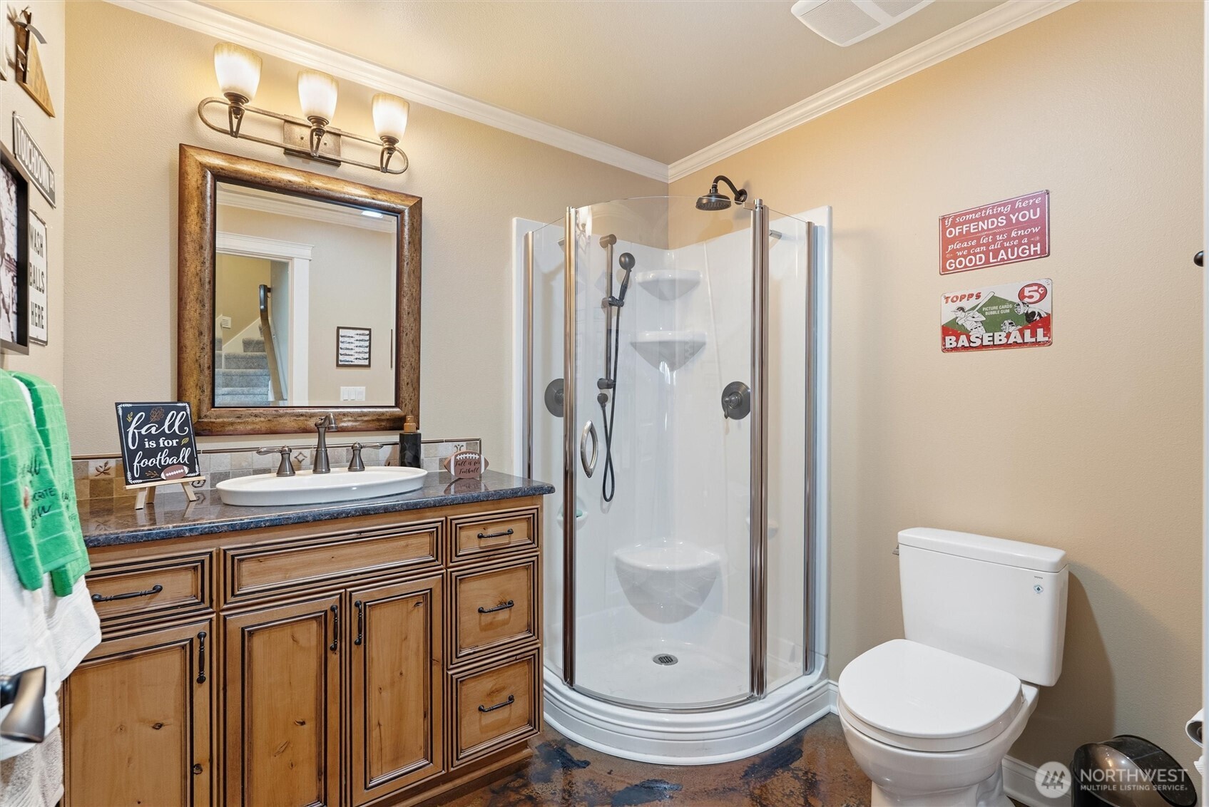 13232 84th Street Southeast Snohomish, WA 98290 - Photo 31 of 40 a bathroom with a toilet a sink and a mirror