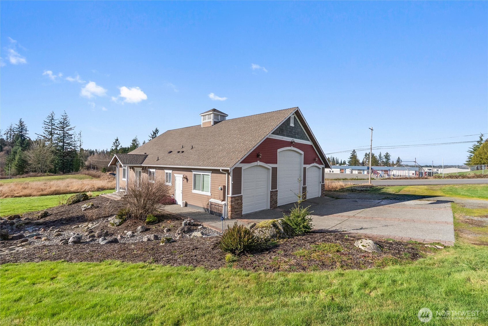 13232 84th Street Southeast Snohomish, WA 98290 - Photo 34 of 40 a front view of a house with garden