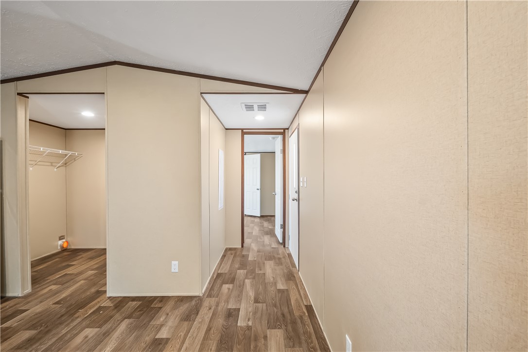13205 South Water Reed Way Topock, AZ 86436 - Photo 20 of 37 a view of a hallway with wooden floor