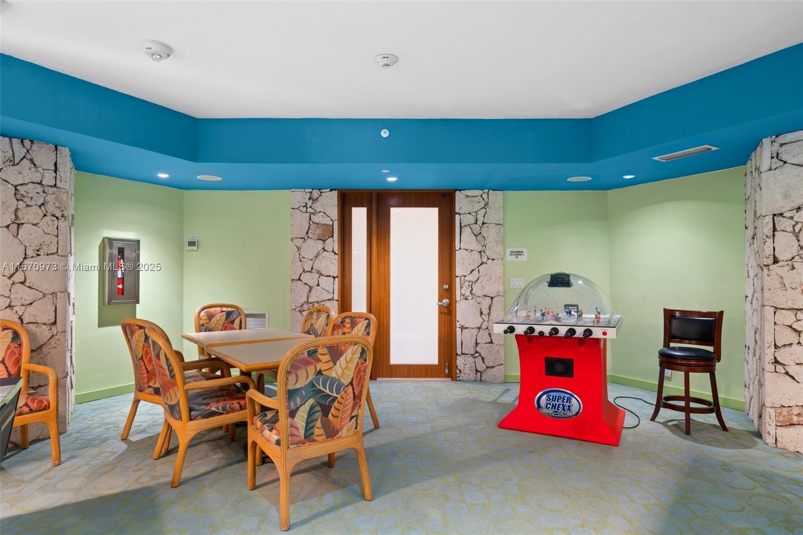 1121 Crandon Boulevard, Unit E105 Key Biscayne, FL 33149 - Photo 32 of 43 a view of a room with gym equipment