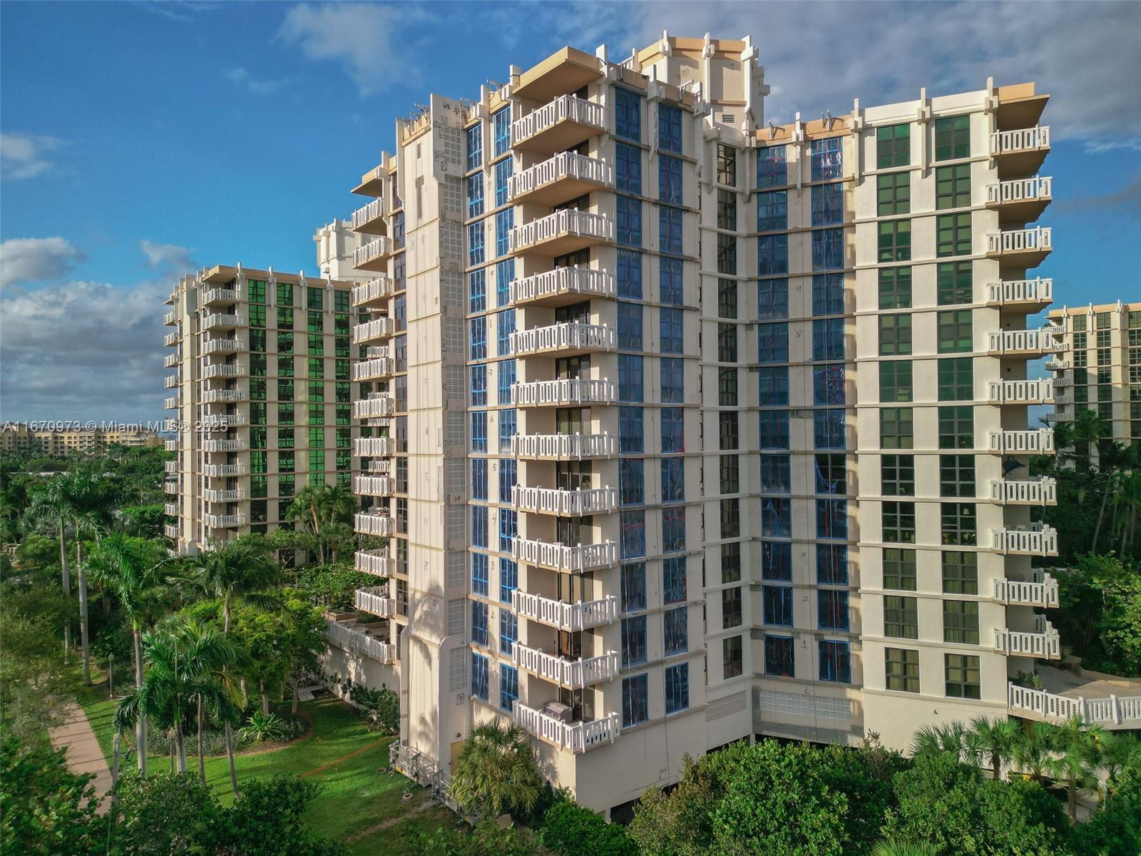 1121 Crandon Boulevard, Unit E105 Key Biscayne, FL 33149 - Photo 40 of 43 a front view of a building