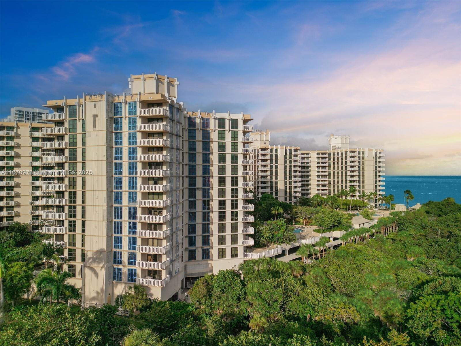 1121 Crandon Boulevard, Unit E105 Key Biscayne, FL 33149 - Photo 42 of 43 a view of a city with tall buildings