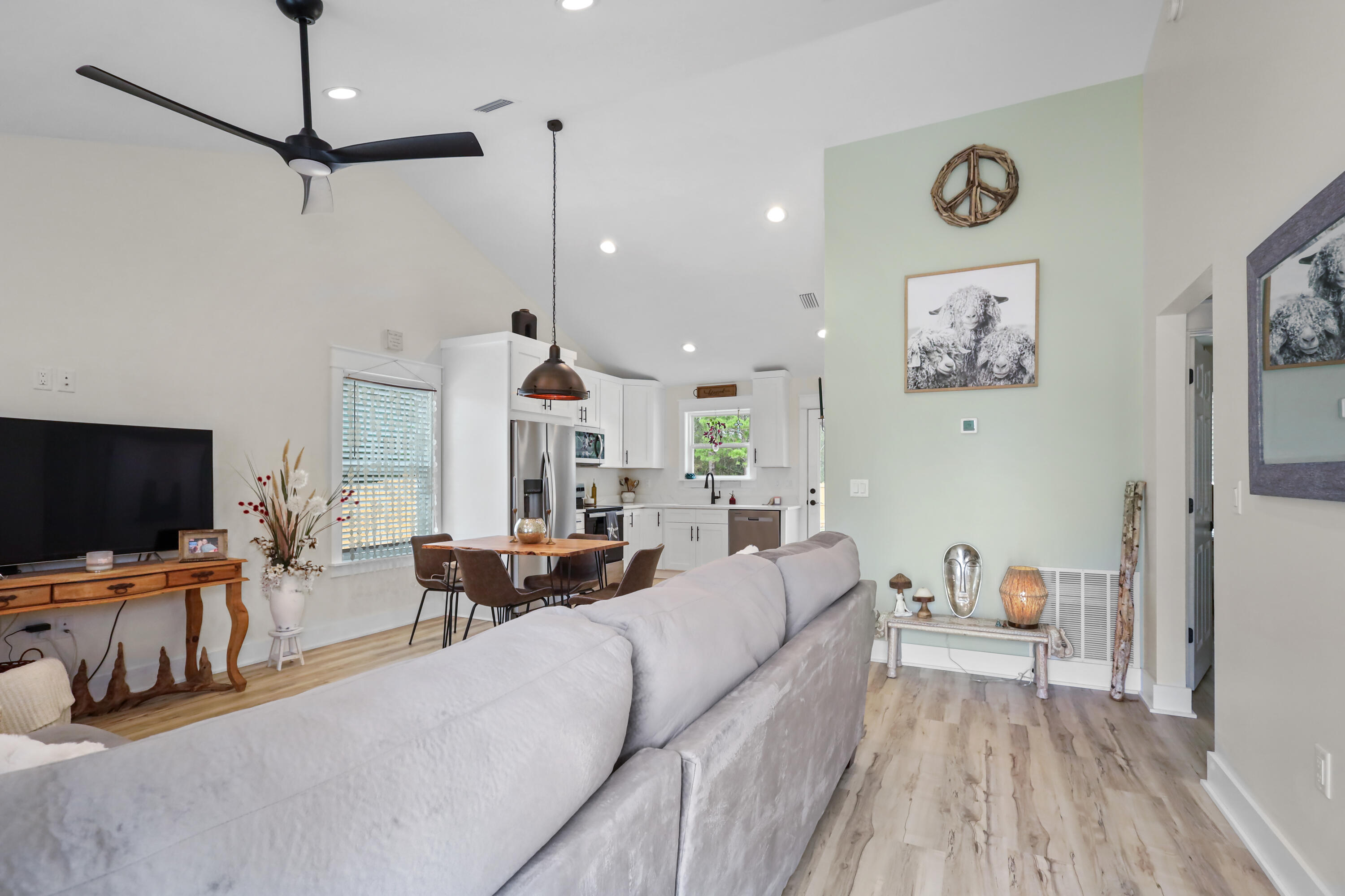 71 Lafavre Lane DeFuniak Springs, FL 32433 - Photo 11 of 32 a living room with furniture and a flat screen tv
