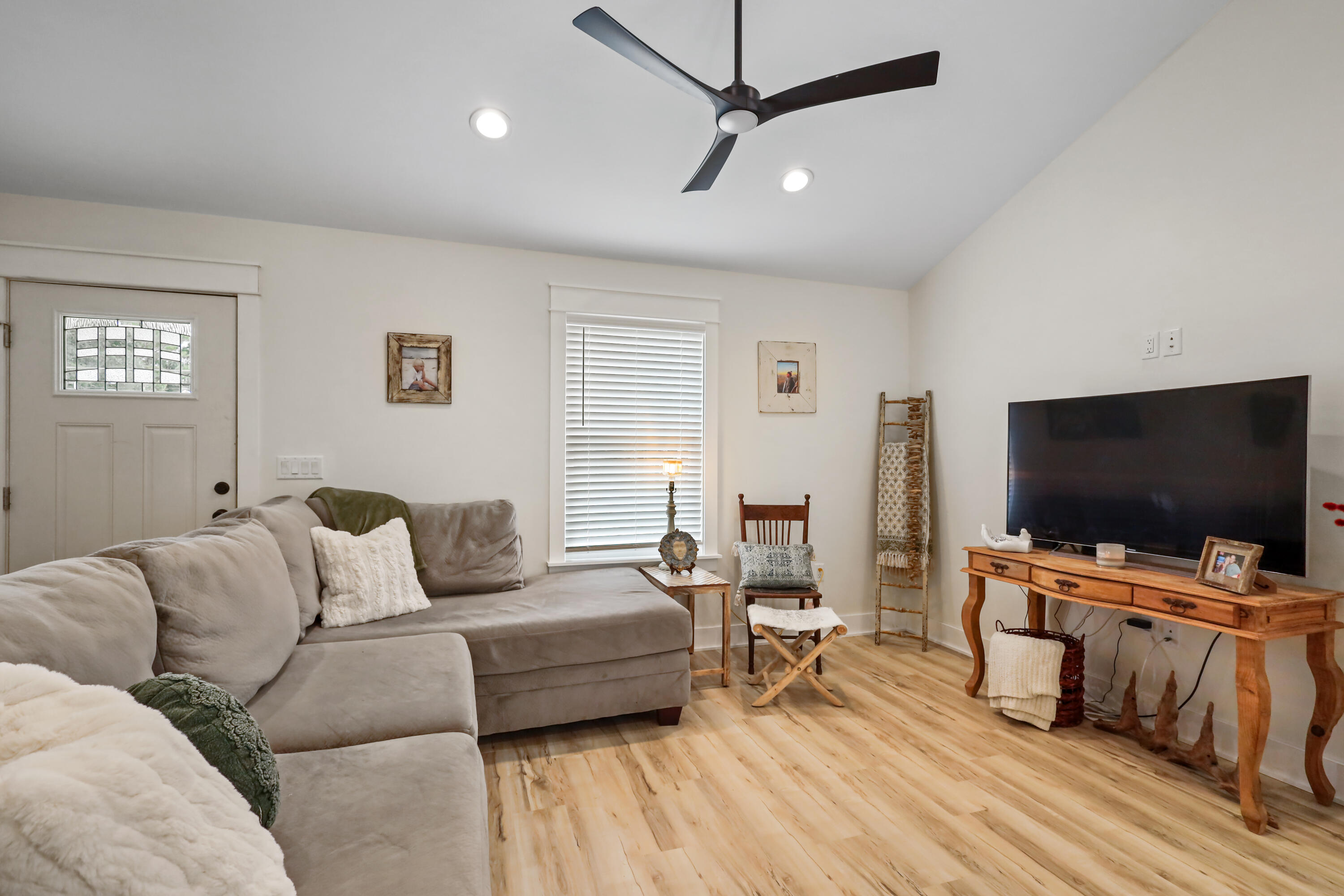 71 Lafavre Lane DeFuniak Springs, FL 32433 - Photo 12 of 32 a living room with furniture and a flat screen tv