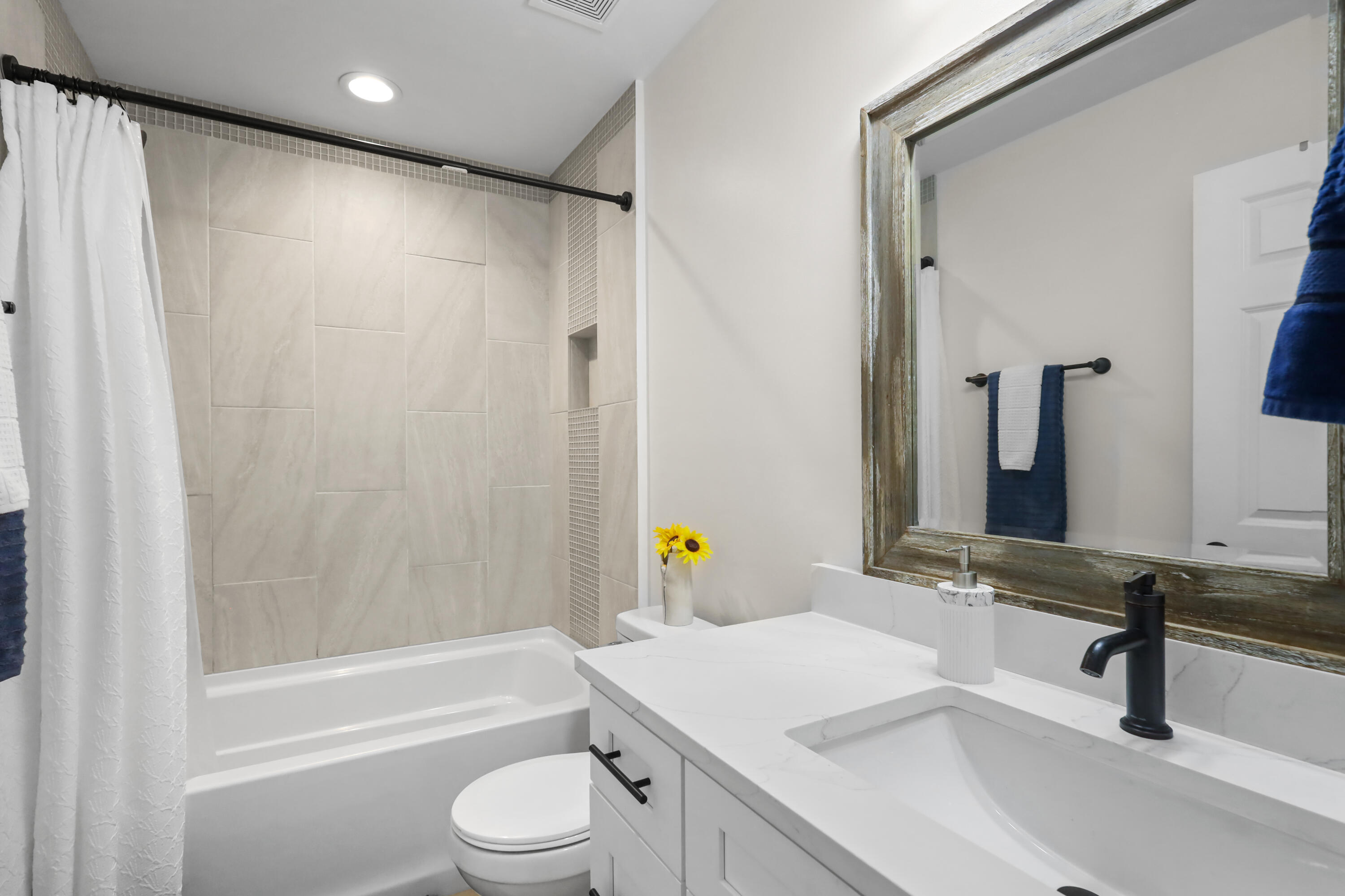 71 Lafavre Lane DeFuniak Springs, FL 32433 - Photo 18 of 32 a bathroom with a sink a toilet and shower
