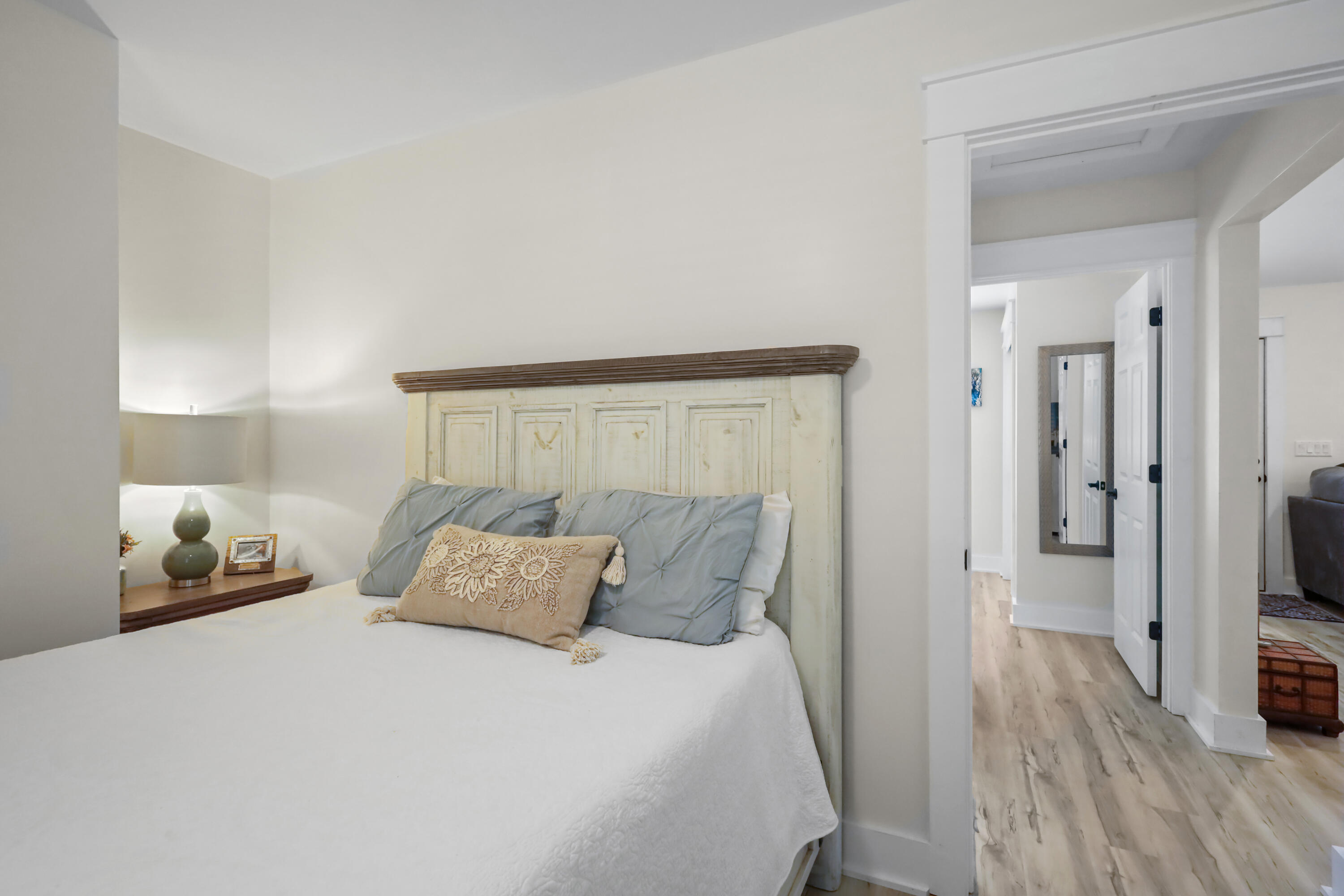 71 Lafavre Lane DeFuniak Springs, FL 32433 - Photo 22 of 32 a large bed sitting in a bedroom and a table