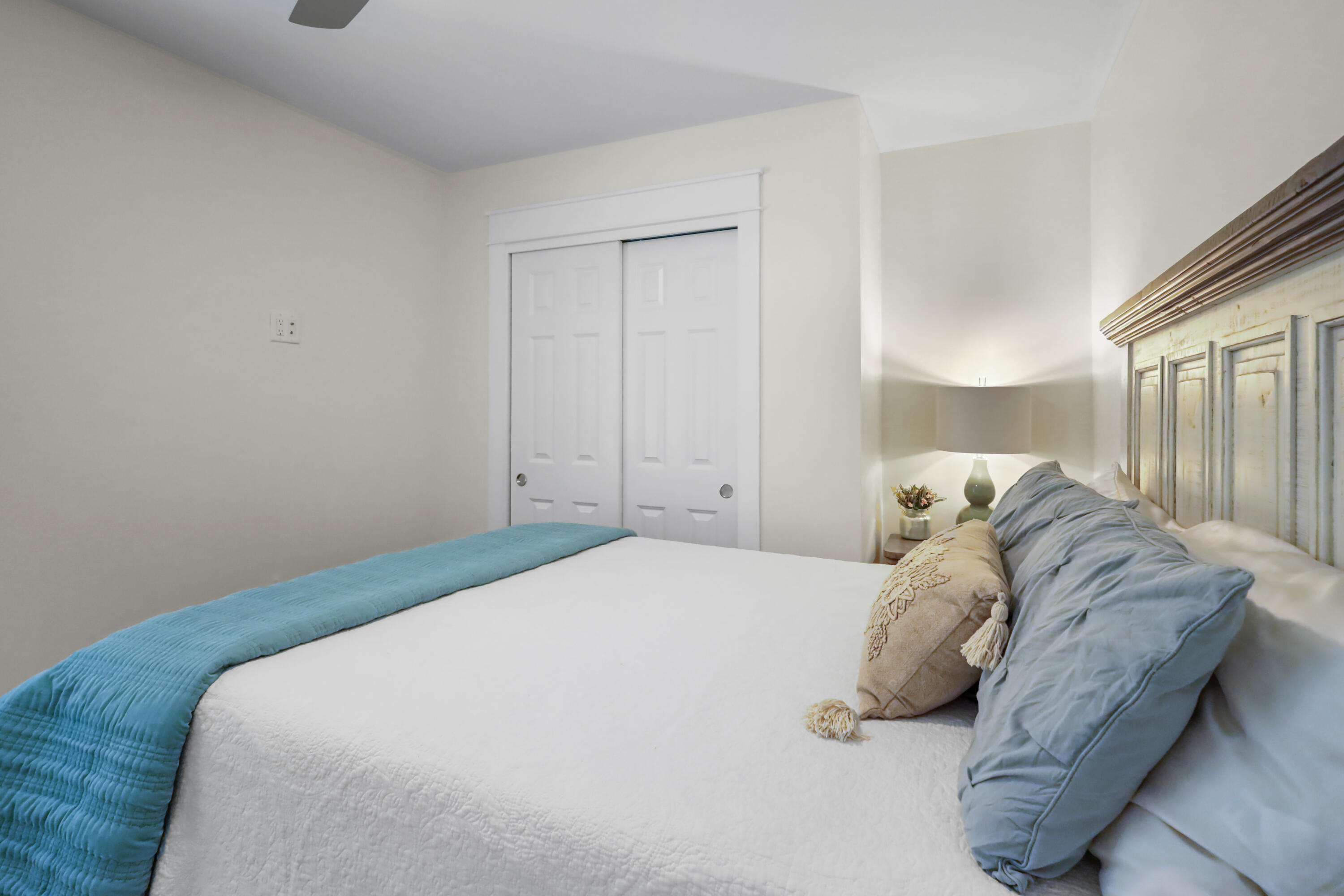 71 Lafavre Lane DeFuniak Springs, FL 32433 - Photo 25 of 32 a bed sitting in a bedroom next to a window