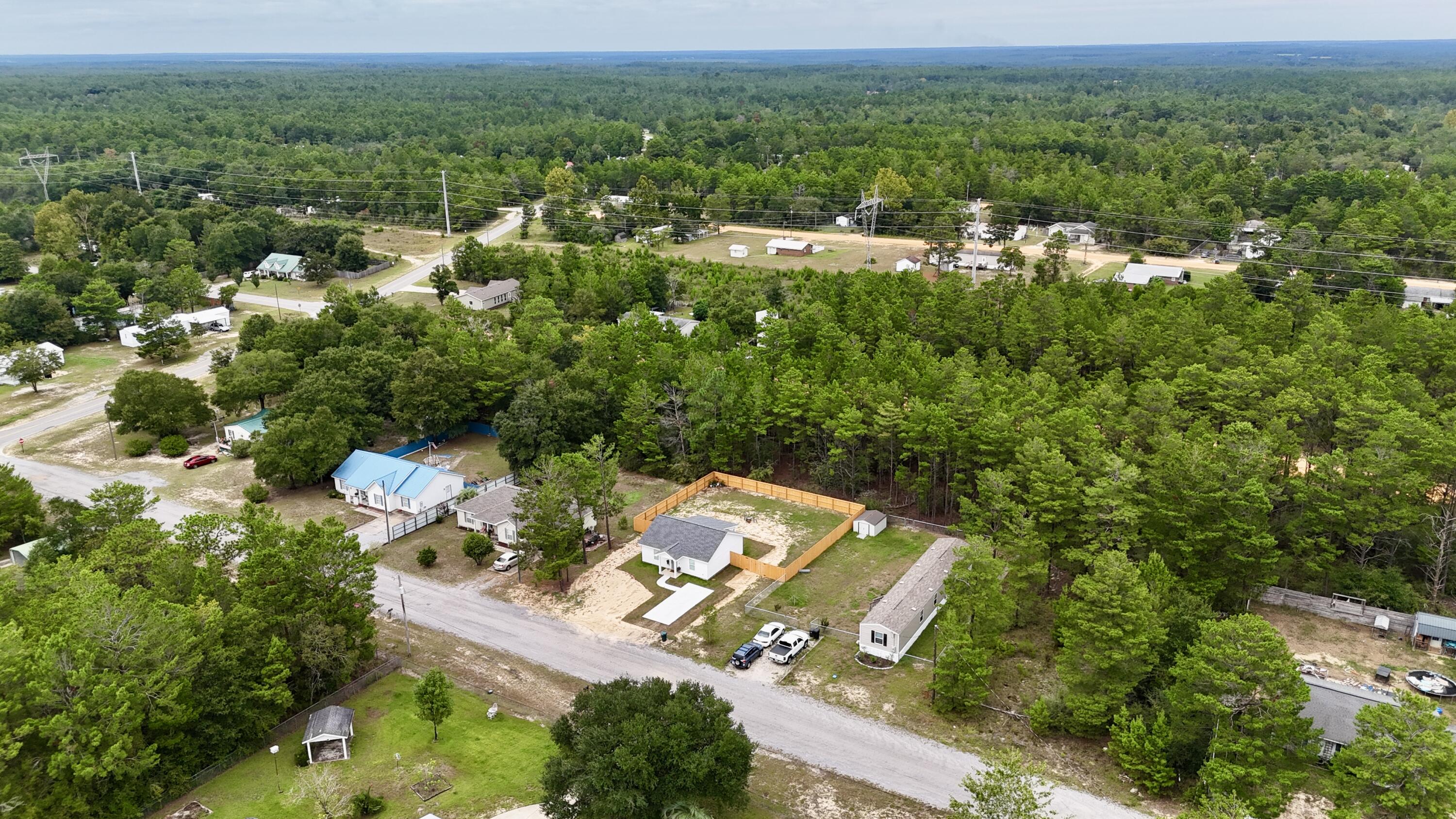 71 Lafavre Lane DeFuniak Springs, FL 32433 - Photo 30 of 32 an aerial view of a house with a yard