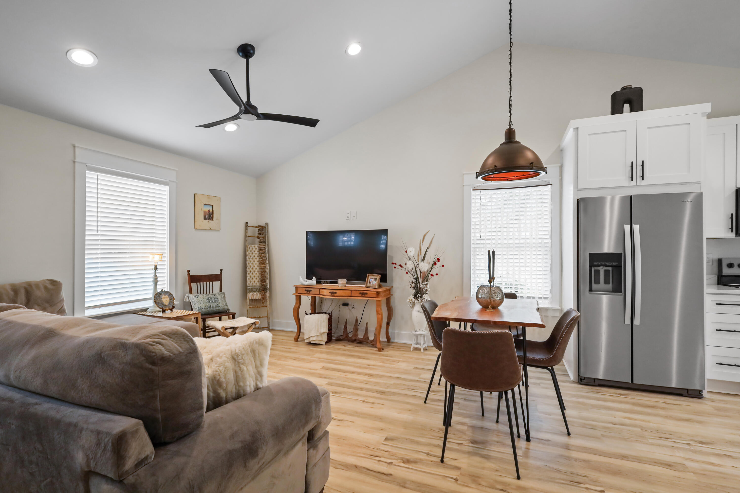 71 Lafavre Lane DeFuniak Springs, FL 32433 - Photo 9 of 32 a living room with furniture a flat screen tv and a fireplace