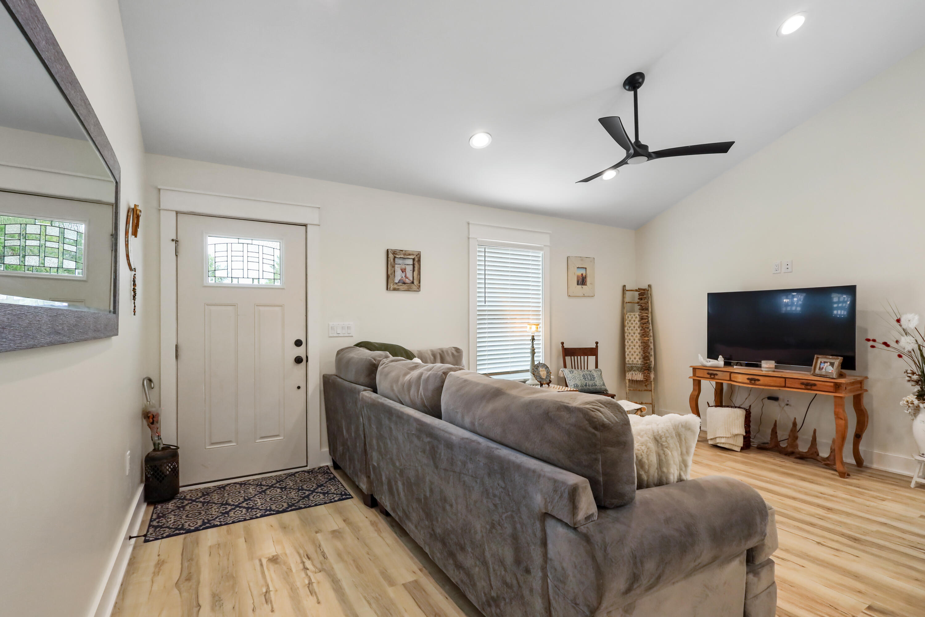 71 Lafavre Lane DeFuniak Springs, FL 32433 - Photo 10 of 32 a living room with furniture and a flat screen tv