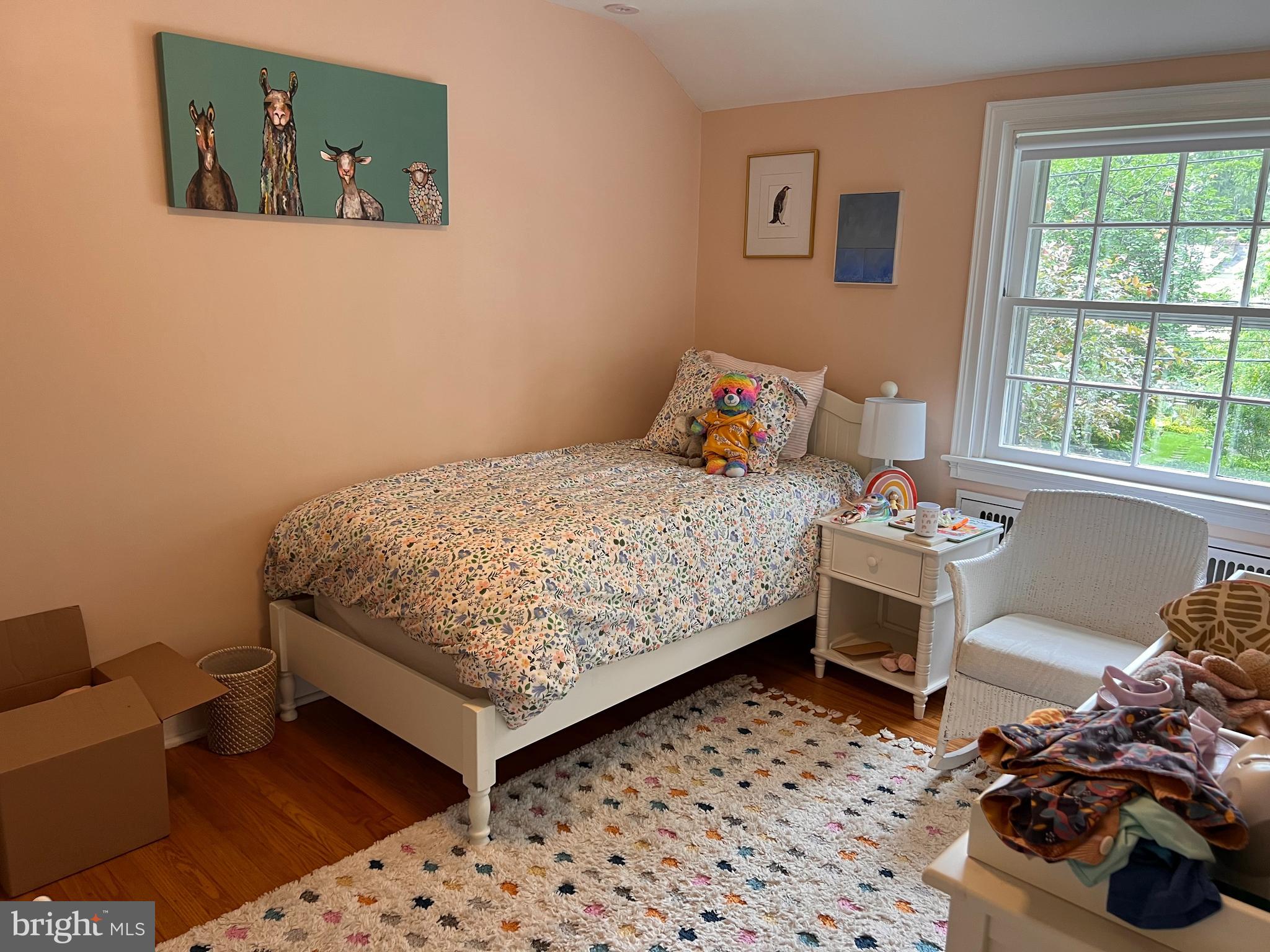 112 Hilltop Road Philadelphia, PA 19118 - Photo 11 of 13 a bedroom with a bed and a window