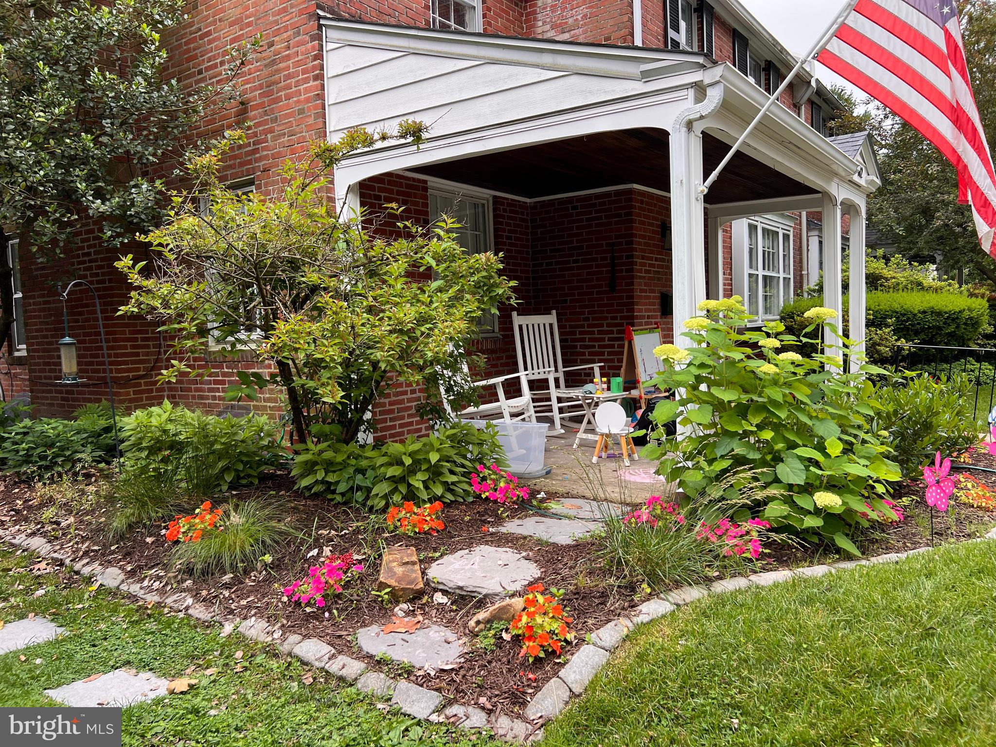 112 Hilltop Road Philadelphia, PA 19118 - Photo 3 of 13 a front view of a house with a yard