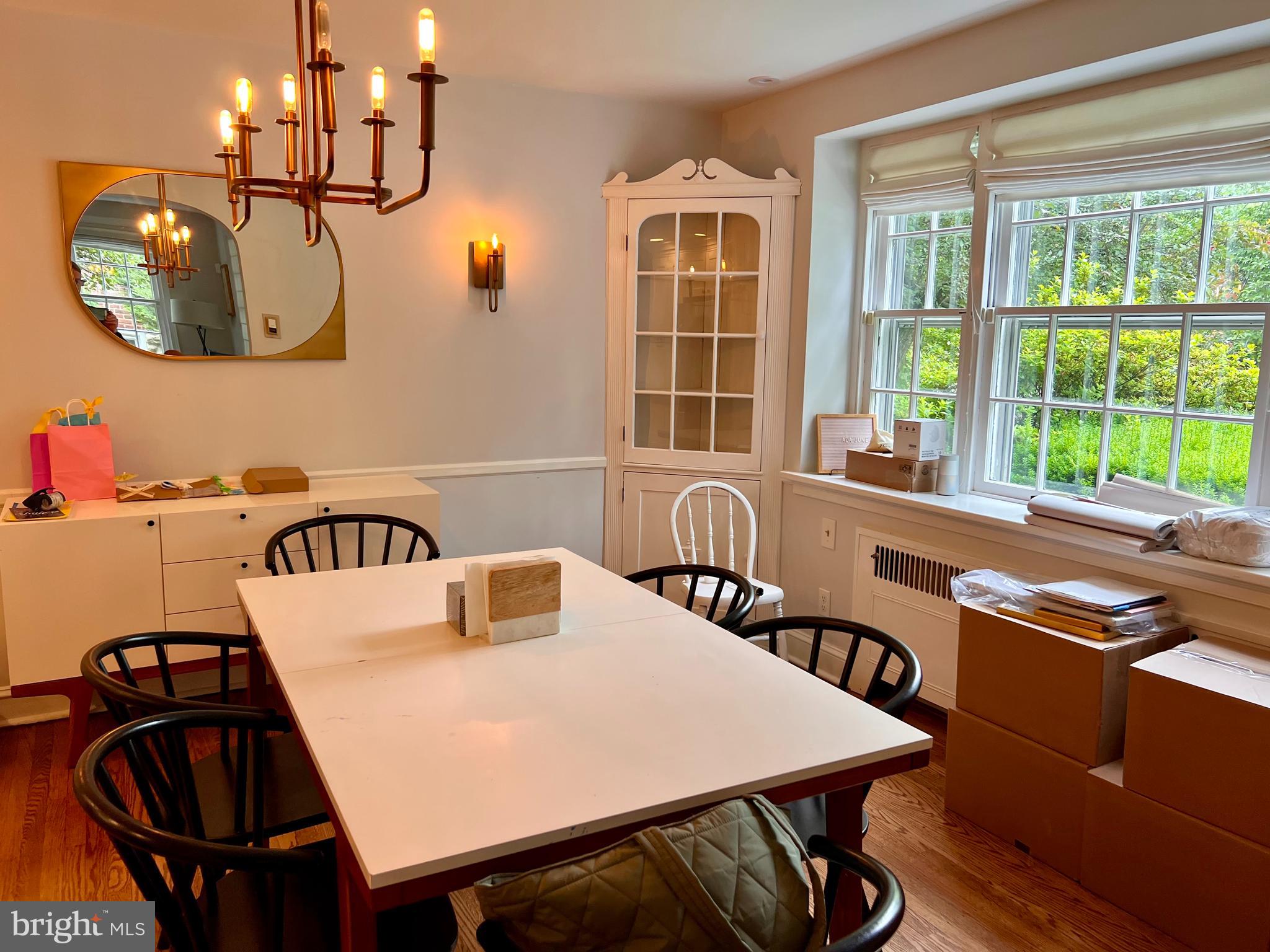112 Hilltop Road Philadelphia, PA 19118 - Photo 7 of 13 a view of a dining room with furniture and window